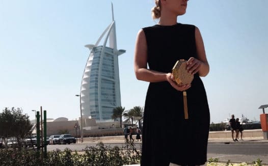 The Green Edition wearing a rented dress and bag