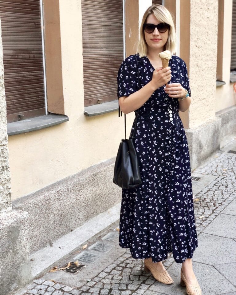Laura wearing a 90s vintage dress and holding an ice cream during a week of outfits in July. 